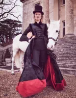 Eva Herzigová. Horse provided by the Stampede Stunt Company who occupy the Gaddesden Place stables.